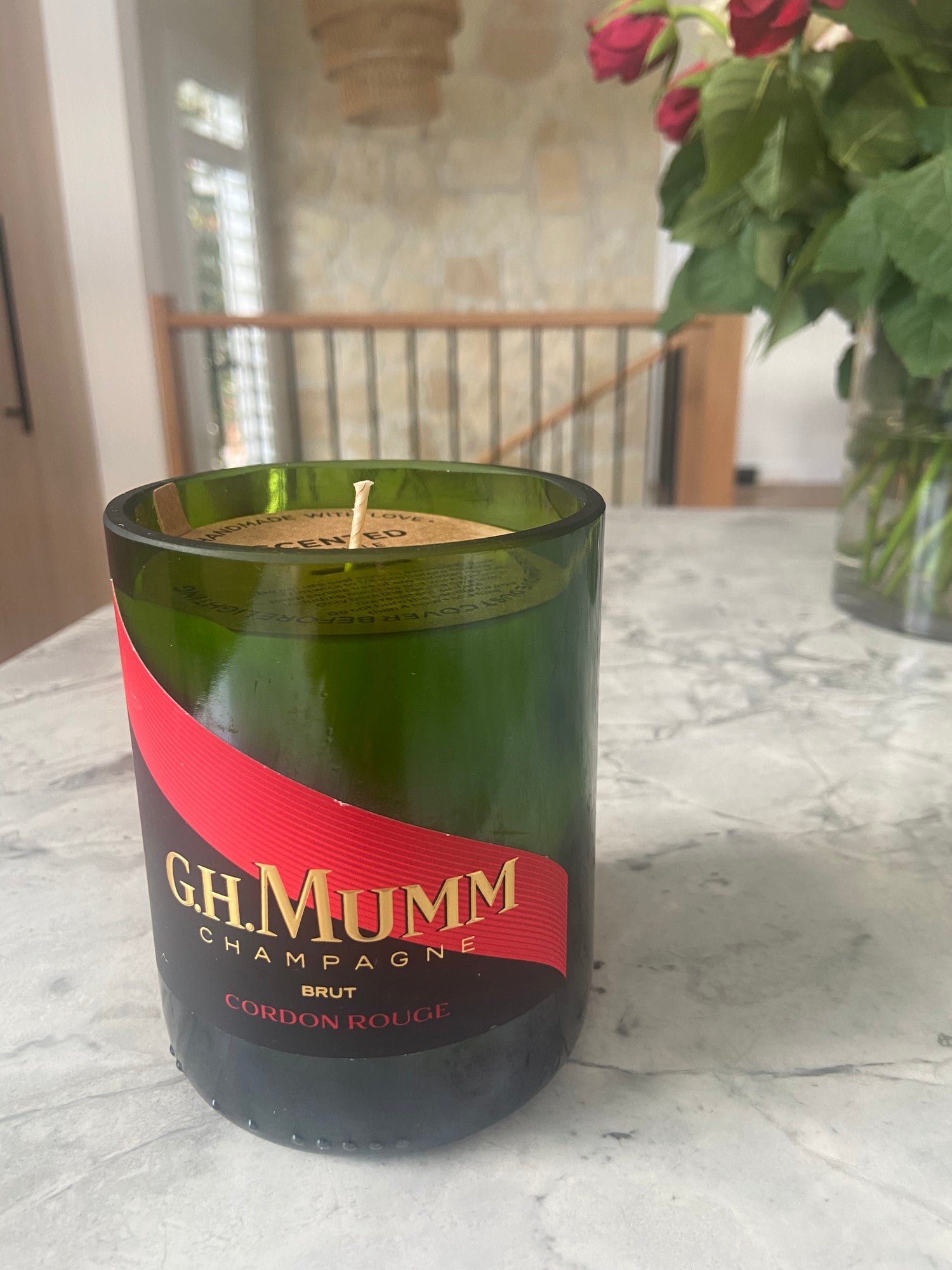 G.H. Mumm Brut soy candle hand-poured in a repurposed green champagne bottle